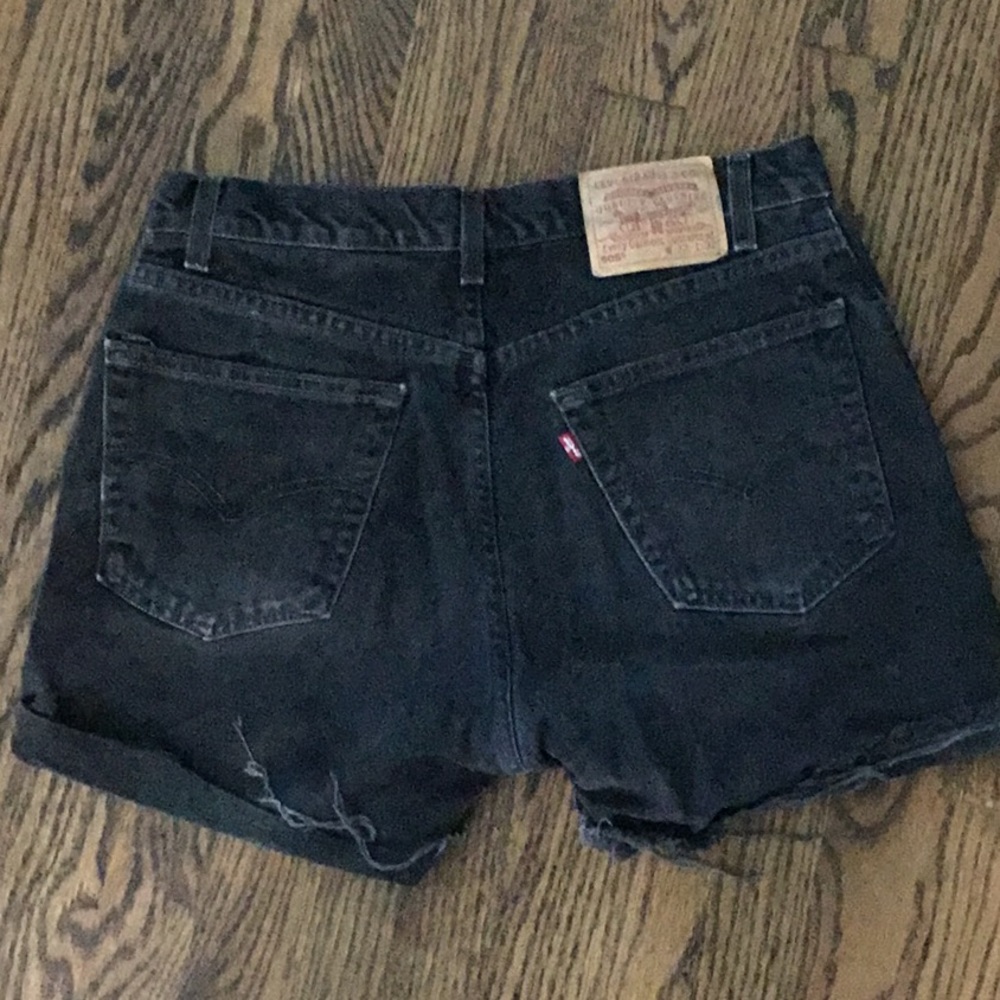 Black Levi’s cut offs fits like a size 10 see pics for tags and vintage distress